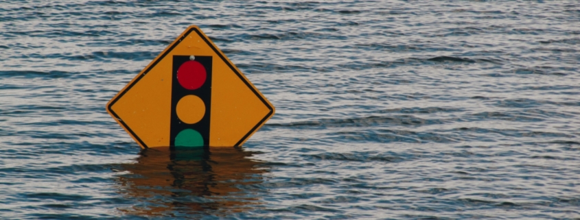 Traffic light sign submerged in water